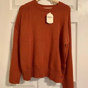 Altar’d State- rust color sweater with bottoms on sides